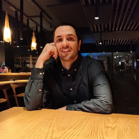 Raúl Marín - Software Engineer and AI Enthusiast, smiling at camera in professional attire